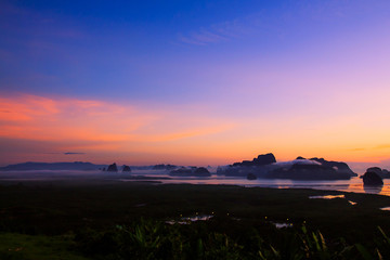 Fototapeta na wymiar Silhouette Travel mountainous near the sea. Samed Nang Chee viewpoint, tropical area Phang Nga Thailand