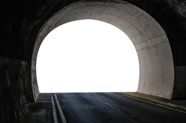 Tunnel in the mountain with a car road and isolated white color exit.