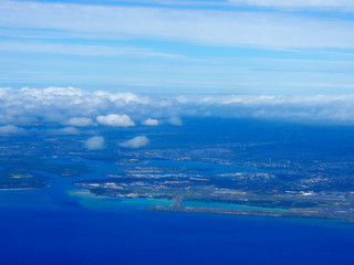 Fototapeta na wymiar Aerial of Honolulu International Airport Coral Runway, Pearl Harbor, and City