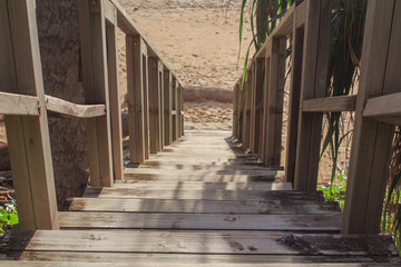 A wooden stairway to the sea. Afternoon beach bright at Nai Thon Beach Phuket Thailand