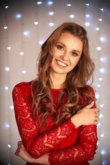 Smiling woman in red dress