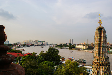 View from the Wat Arun temple on the Chao Phraya river and Royal Palace. Bangkok Thailand