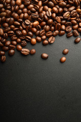 Coffee beans. On a wooden background. Top view. Copy space.