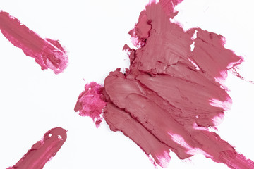 Lipstick smudged on white background,show pigment and texture of color