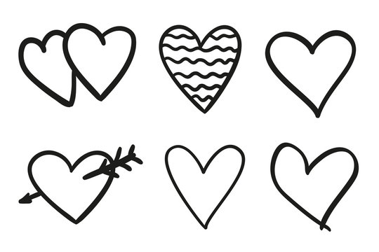 Hand drawn grunge hearts on isolated white background. Set of love signs. Unique image for design. Black and white illustration. Simple elements for design