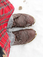leather boots on the snow