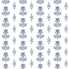 Seamless floral pattern in vector. Small blue paisley, flowers and dots on a white background.
