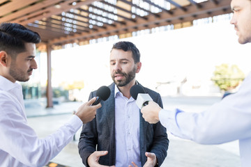 Publicly Giving Interview To Journalists