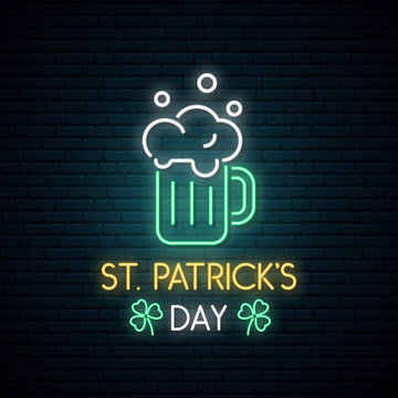 Happy Saint Patrick's Day neon sign. Bright signboard with Beer mug.Vector St. Patrick's Day light banner.