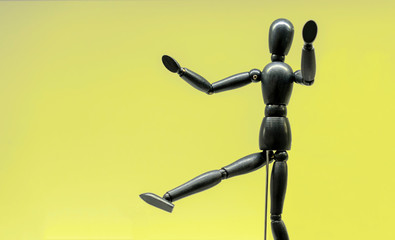 Wooden doll of a gestalta with various poses.