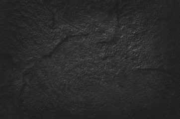 Fototapeta premium Dark grey black slate texture in natural pattern with high resolution for background and design art work. Black stone wall.