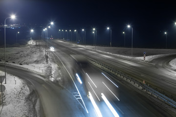 Fototapeta na wymiar truck moves at night on the highway