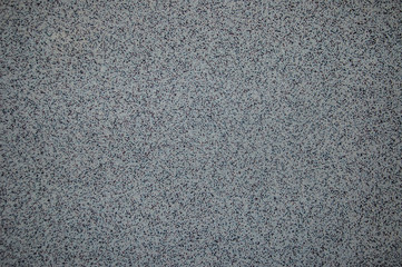 Grey tesselated plaster texture. Abstract background