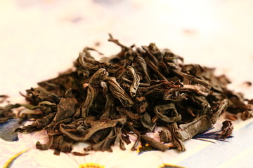 green tea leaves isolated on white background