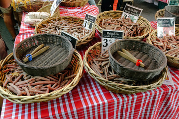 Small sausages at local market in Arles, France 