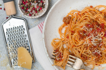 Pasta with tomato sauce, meat, cheese and spices. Lunch or dinner for gourmets. Spaghetti Bolognese. Italian (Mediterranean) cuisine. Selective focus