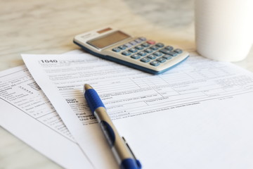Tax Forms calculator pen paper finance business 