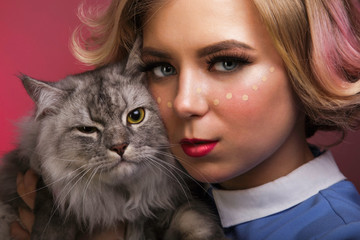 portrait of a woman with cat