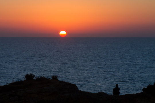 P&ocirc;r do Sol no mar