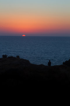 P&ocirc;r do Sol no mar