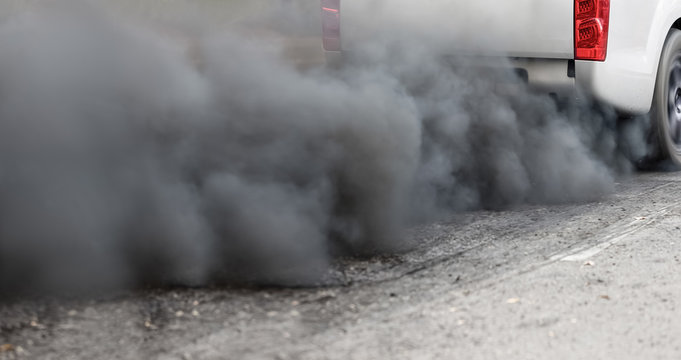 Air Pollution Crisis In City From Diesel Vehicle Exhaust Pipe On Road