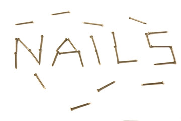 nails laid out in the form of words