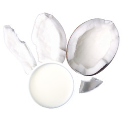 Coconut slice piece glass of coconut milk on white background isolation, top view