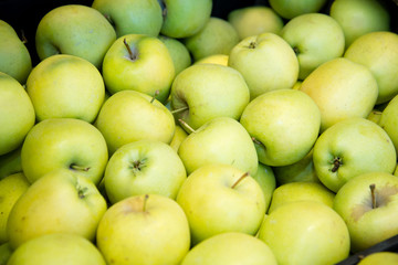 ripe apples on the counter in the supermarket