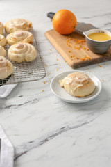 Freshly Baked Homemade Orange Rolls on Kitchen Counter