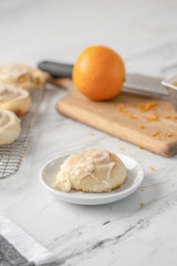 Freshly Baked Homemade Orange Rolls on Kitchen Counter