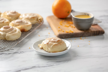 Freshly Baked Homemade Orange Rolls on Kitchen Counter