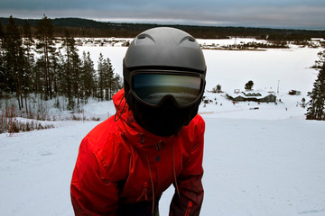 closeup snowboarder looks into the camera