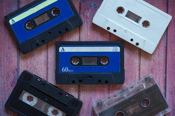 Fototapeta premium Several old analog cassette tapes of various colors