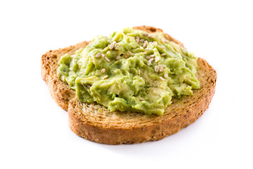 Close up of toasted breads with avocado and sesame seeds isolated on white background. 