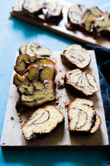 Babka jewish baked is ready to be eaten, over a wooden background, easter concept.