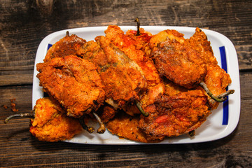 Roasted breaded paprika on white ceramic plate