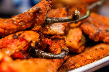 Roasted breaded paprika on white ceramic plate