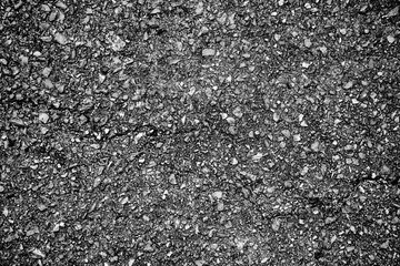 crack and texture of asphalt road - top view background.