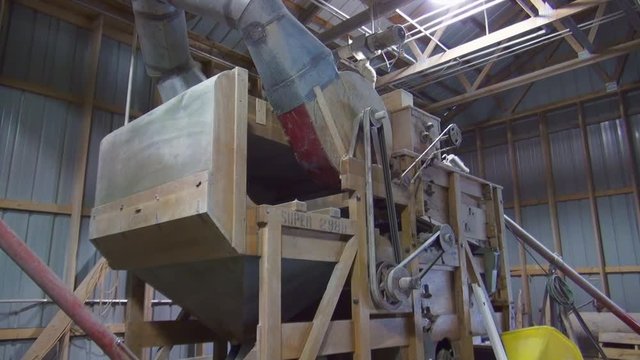 grain cleaning assemblage in a mill, tilt up to down
