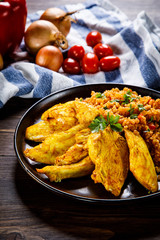 Roasted meat, groats and vegetables