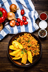 Roasted meat, groats and vegetables