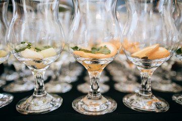 Many glasses for drinks on the wedding table
