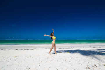 Fototapeta na wymiar Zanzibar, woman, yellow bikini, sexy