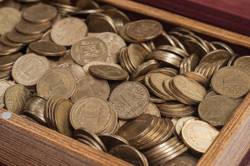 heap of coins in denomination one hryvnia close up