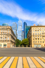 Crosswalk and street view of of Kutuzov Avenue and business complex Moscow City.