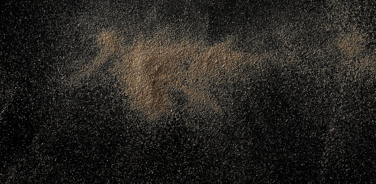sand isolated on black background, top view, clipping path