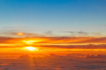 Fototapeta na wymiar Beautiful Golden Sunset over Clouds