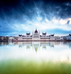Naklejka premium The Hungarian Parliament with river Danube in the morning