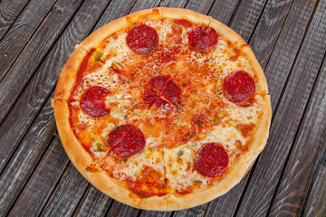  appetizing, fresh pizza on the table, for a design decoration in cooking
