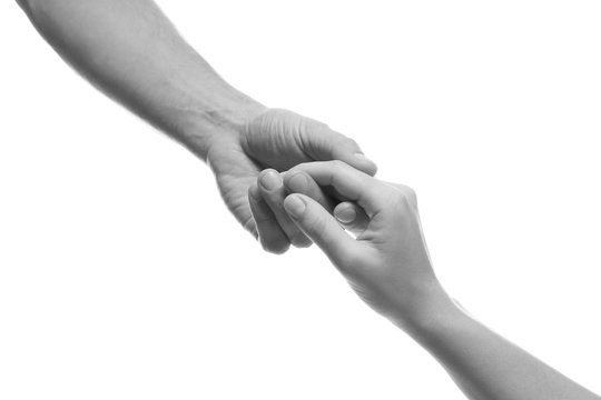 Man and woman holding hands on white background, closeup. Help concept